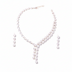 Zircon tear drop necklace and earrings set on a white background