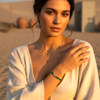 Woman in a white garment with jewelry in a desert setting