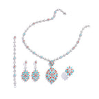 The Accessory Bar Alya bridal jewelry set featuring a necklace, earrings, bracelet, and ring with turquoise and coral stones.