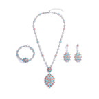 The Accessory Bar Alya bridal jewelry set featuring a necklace, earrings, and bracelet with turquoise and coral stones.