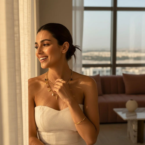 The Accessory Bar Dina necklace featuring a simulated pearl pendant on a slim silver-tone stainless steel chain.