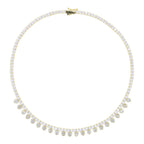 The Accessory Bar Hessa gold-plated tennis choker with pavé cubic zirconia and dangling heart-shaped stone accents.
