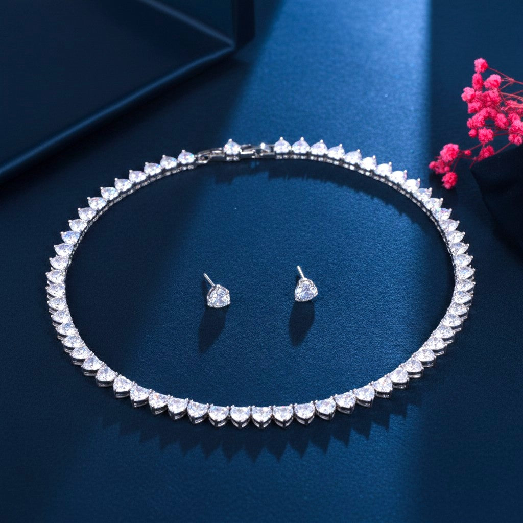 The Accessory Bar Joud bridal tennis necklace and stud earring set with oversized cubic zirconia in silver-tone alloy.