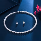 The Accessory Bar Joud bridal tennis necklace and stud earring set with oversized cubic zirconia in silver-tone alloy.