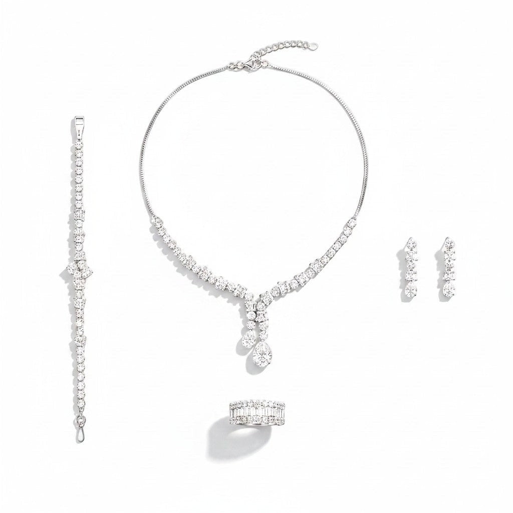 The Accessory Bar Nada 4-piece jewelry set featuring a silver-tone necklace, drop earrings, ring, and bracelet with cubic zirconia.