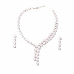 The Accessory Bar Nadia set featuring a silver-tone tennis necklace and matching drop earrings with clear cubic zirconia