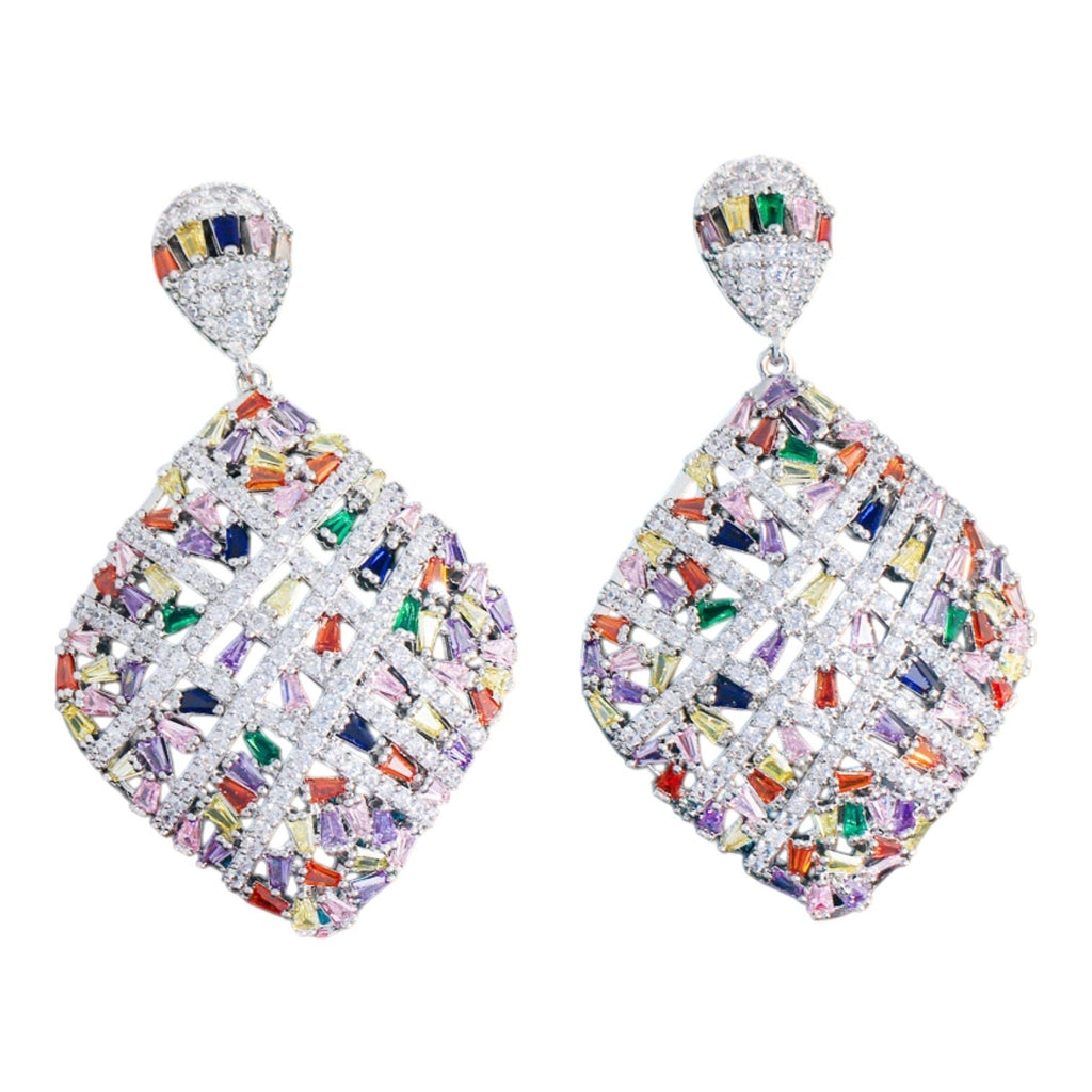 The Accessory Bar Saba rhodium-plated copper drop earrings featuring a geometric rhombic design with multicolour cubic zirconia stones.