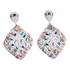 The Accessory Bar Saba rhodium-plated copper drop earrings featuring a geometric rhombic design with multicolour cubic zirconia stones.