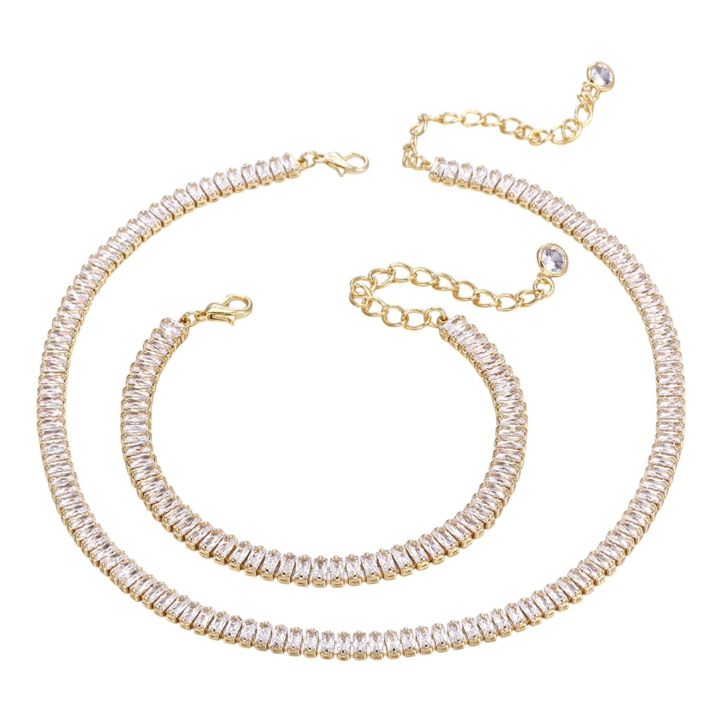 The Accessory Bar Riva set featuring a gold-plated tennis necklace and matching bracelet with clear cubic zirconia.