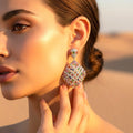 The Accessory Bar Saba statement earrings featuring multicolour cubic zirconia in a geometric rhombic drop design.
