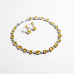 The Accessory Bar Sahara set featuring a citrine yellow cushion CZ necklace and matching drop earrings in gold-plated.