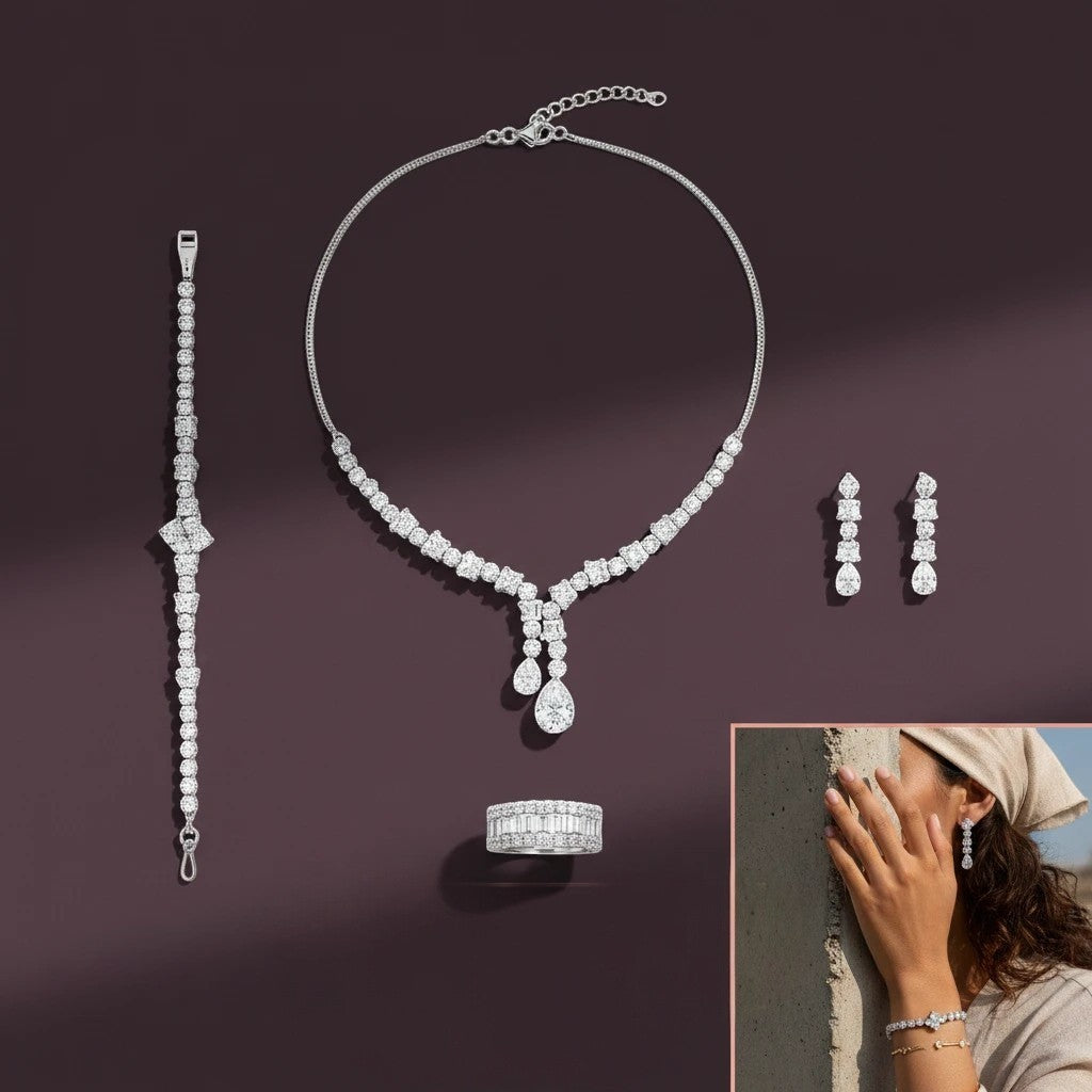 The Accessory Bar 4-piece silver-tone jewelry set with clear cubic zirconia, including necklace, earrings, and ring.