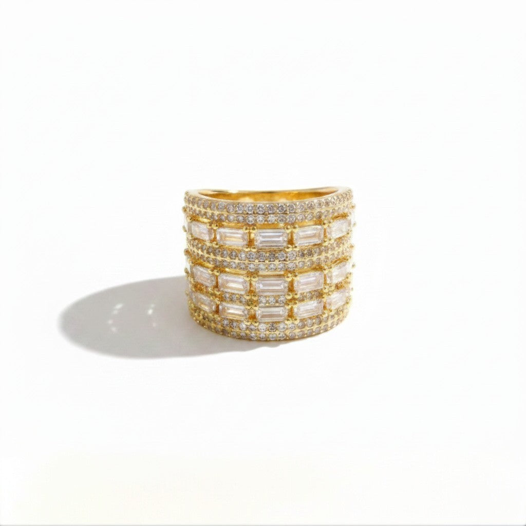 The Accessory Bar Tala ring in 18K gold-plated stainless steel with wide pavé cubic zirconia baguette stones