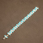 The Accessory Bar The Turk bracelet featuring oval turquoise stones surrounded by sparkling clear crystals