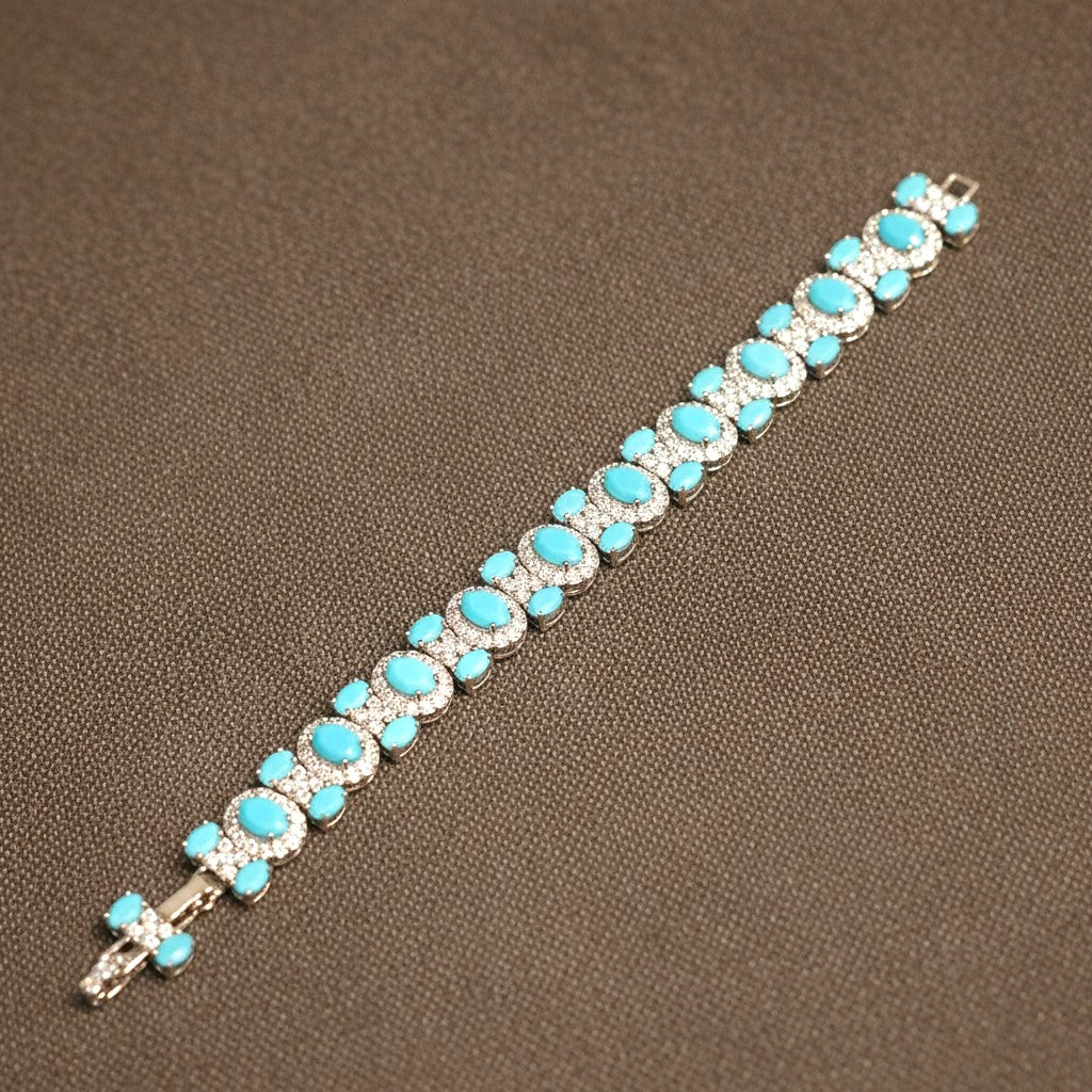 The Accessory Bar The Turk bracelet featuring oval turquoise stones surrounded by sparkling clear crystals