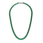 The Accessory Bar Verde tennis necklace in silver-tone rhodium-plated steel with emerald green baguette-cut crystals.
